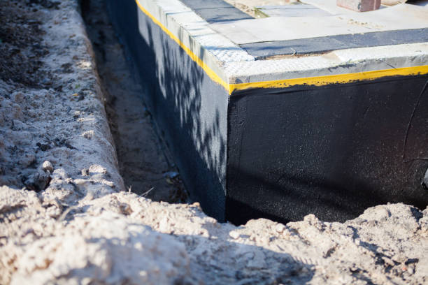 Professional Waterproofing technician working in Marlboro, NY